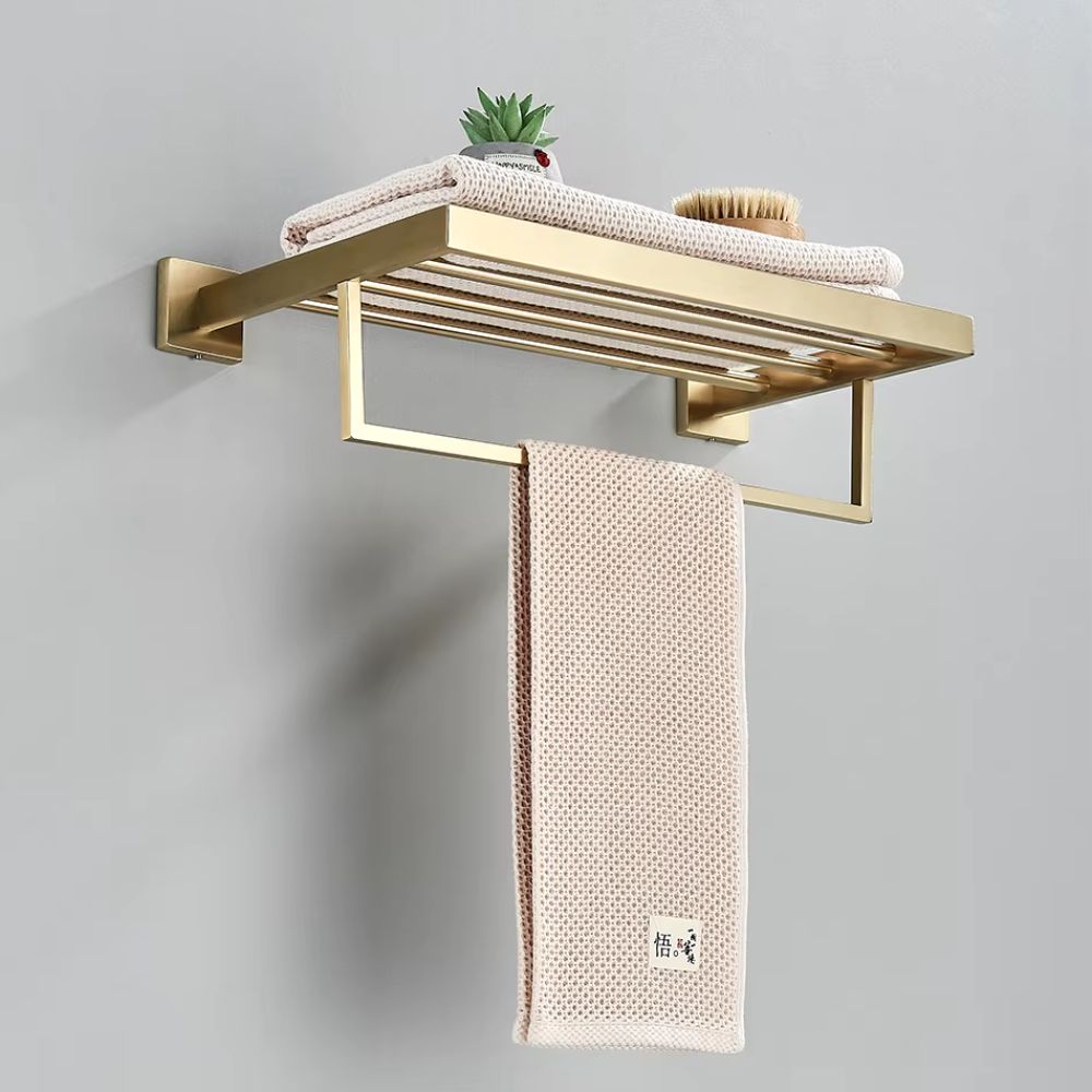 porta toalha metálico dourado