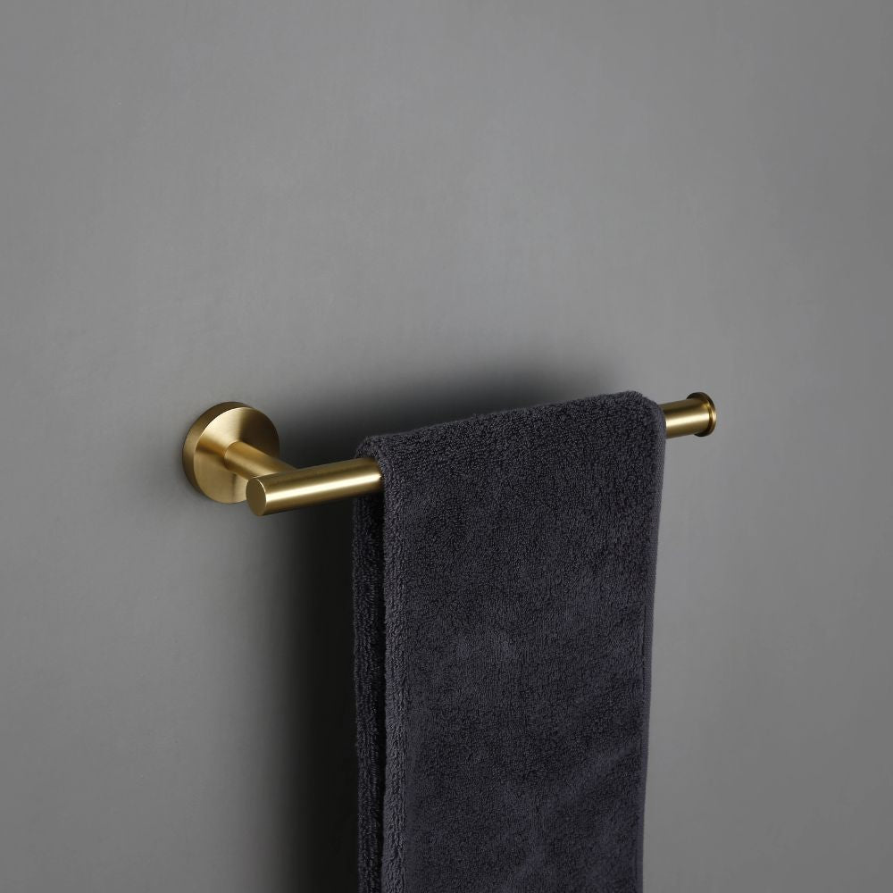 porta toalha metálico dourado