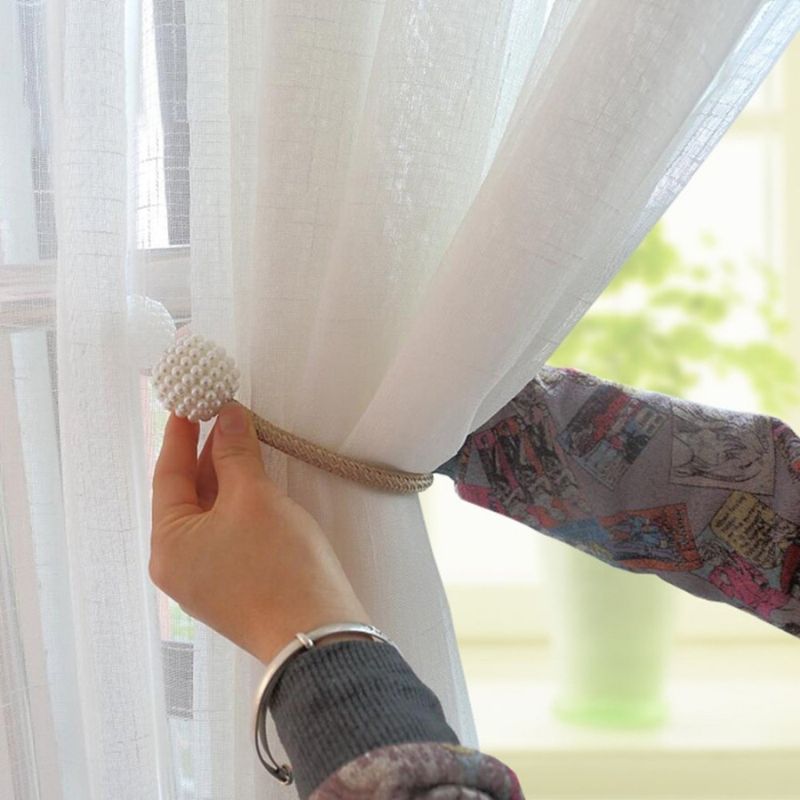 Prendedor de Cortina